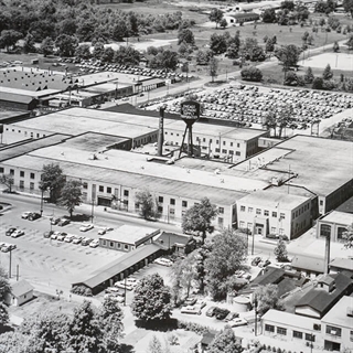 Black and white image of CTS' Elkhart facility  from 1900