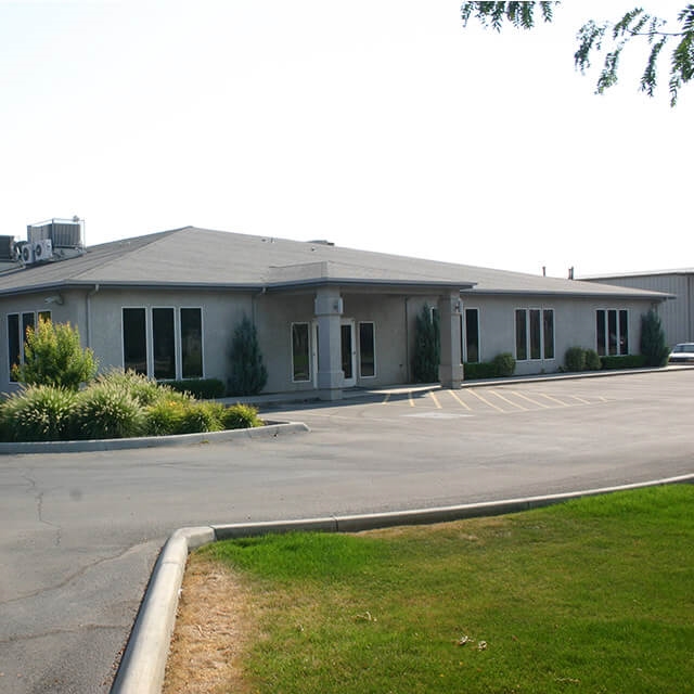 CTS facility with parking lot with green grass located in Boise, ID