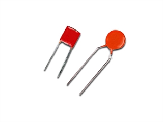Two CTS capacitors on white background
